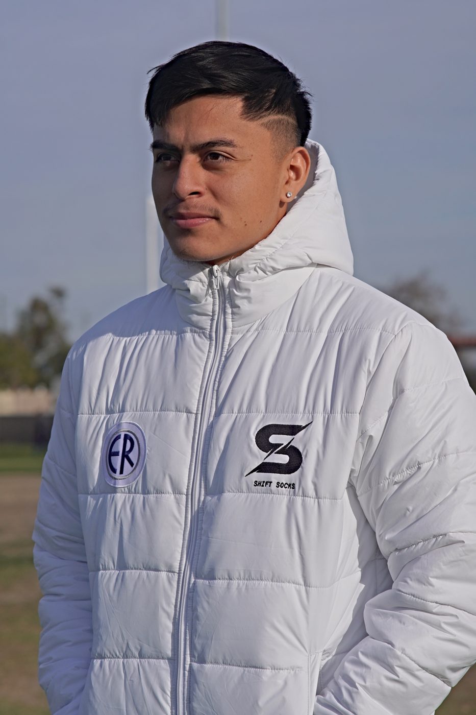 Custom white padded team jacket with club crest